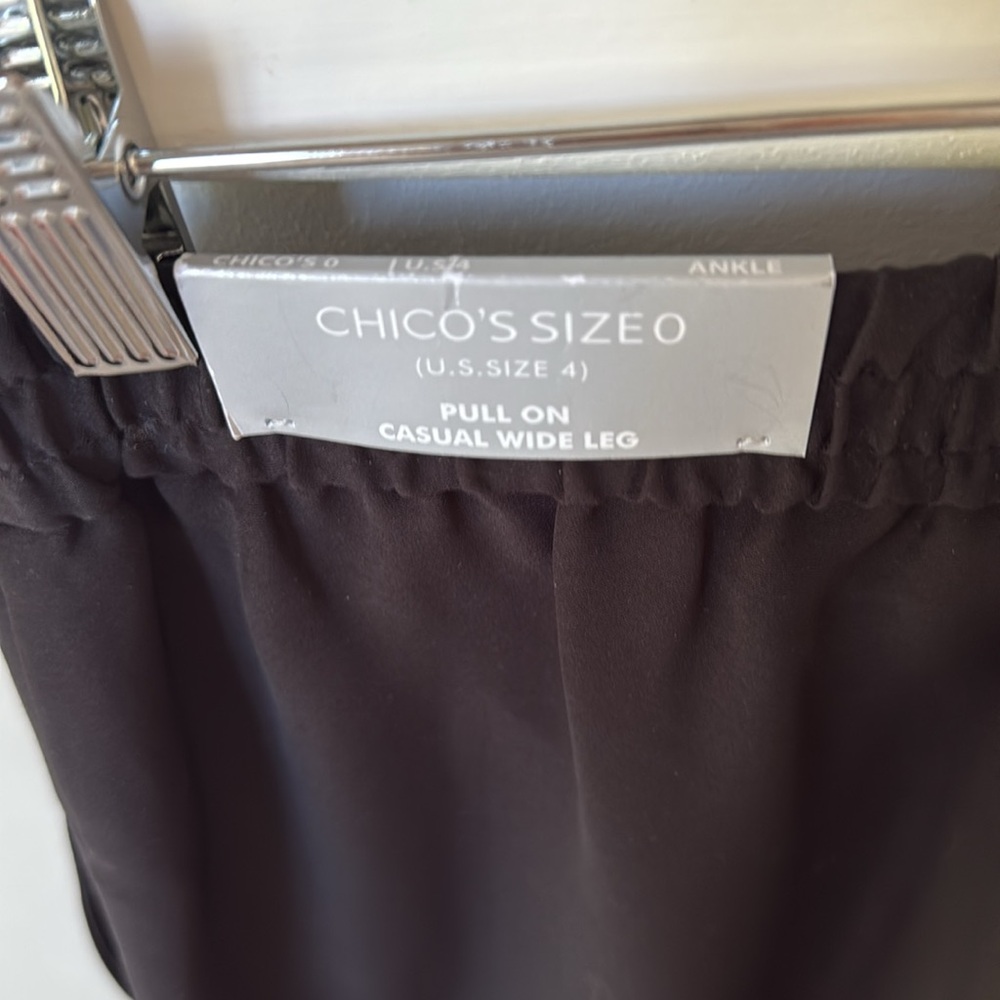 Chico's Black and Red Wide Leg Pants with Floral Embellishments.
Oasis paradise - Picture 6 of 9